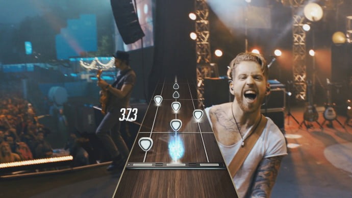 Guitar Hero Live promises a more immersive experience with a first-person perspective and live-action crowds and band-mates.